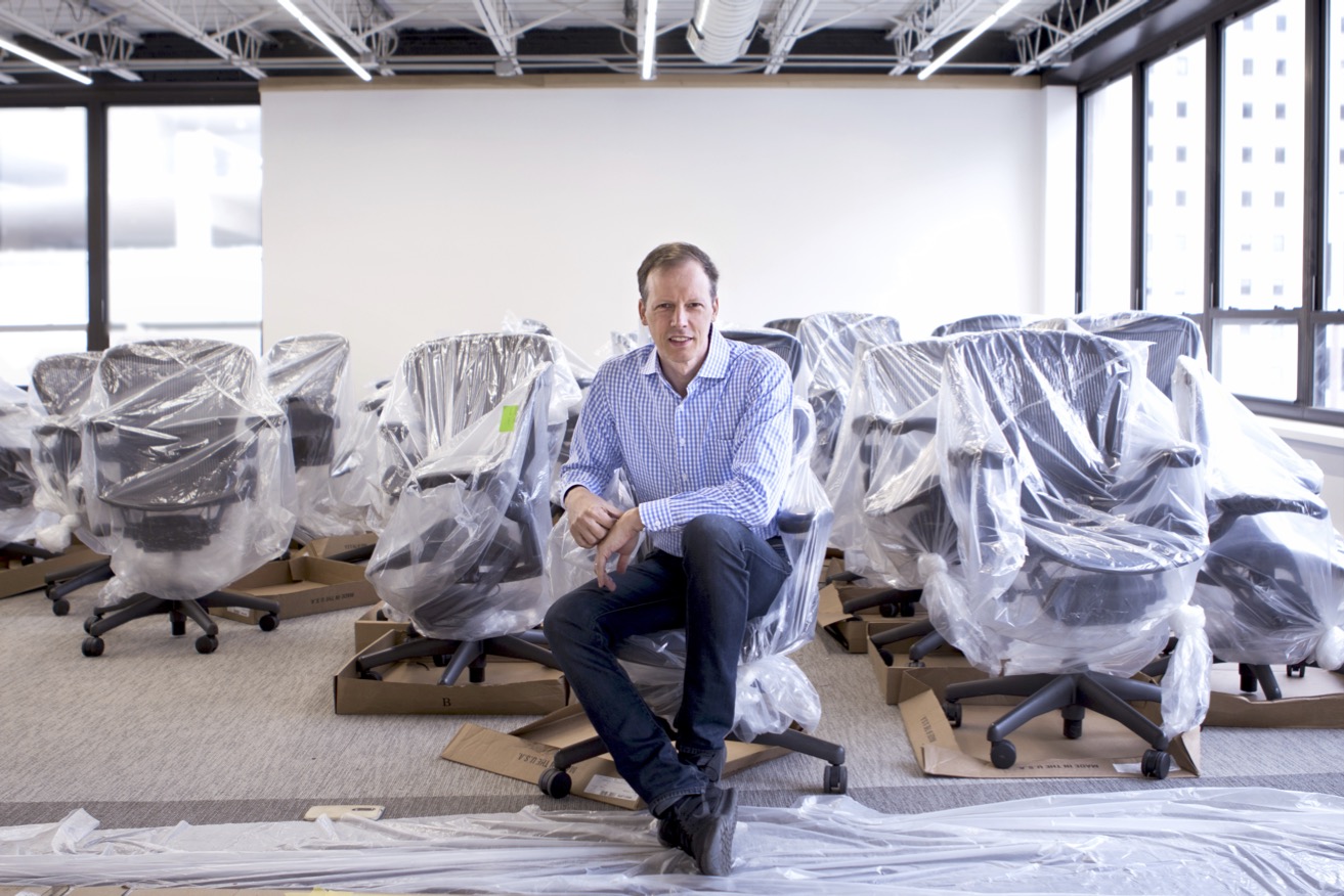 Jim McKelvey in a new office space with chairs